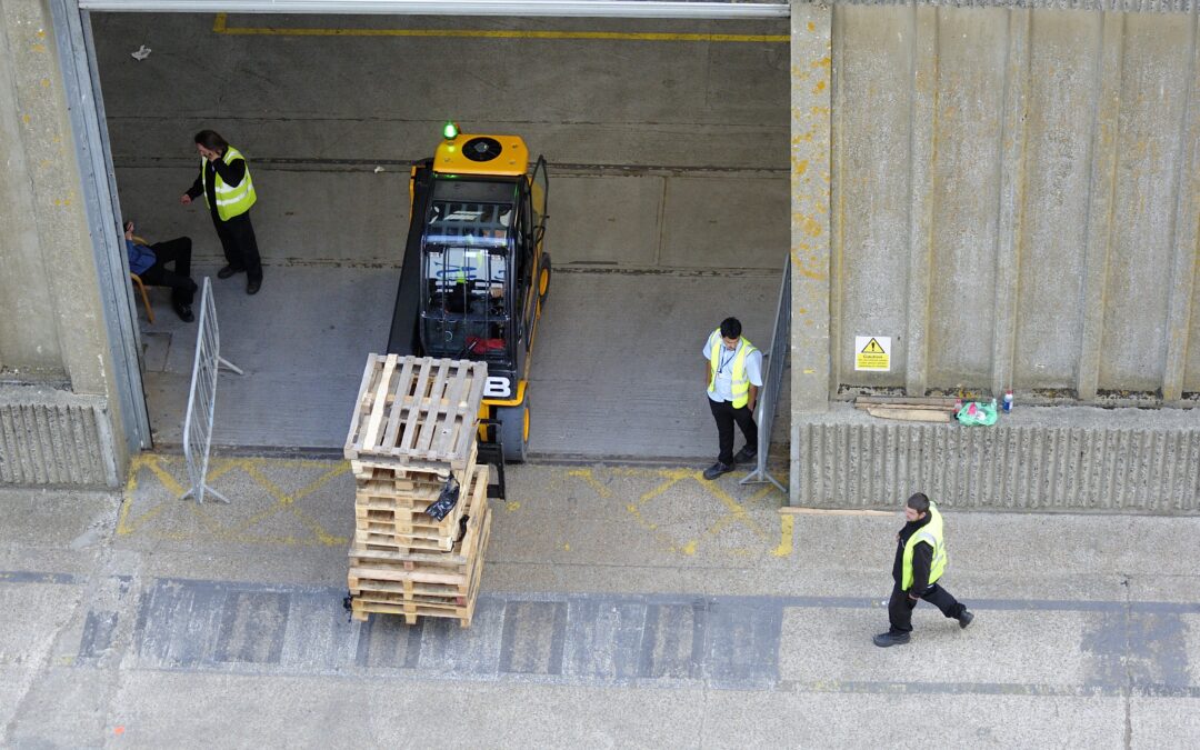 Workers on Foot Near Traffic and Mobile Plant