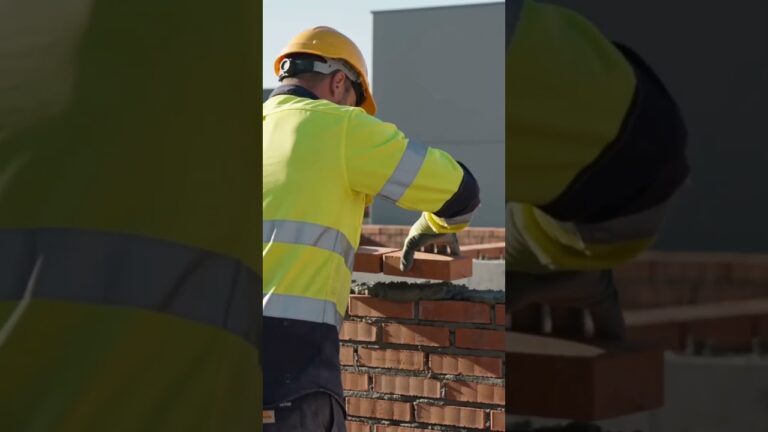 Bricklayer in hi vis and hard hat laying bricks, from Safety Man Dan Silica Awareness Part 1